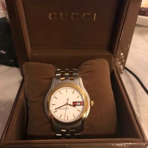 Gucci watch two tone with complete inclusion